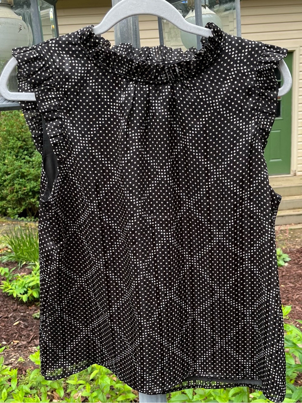 J Crew black sleeveless top, gray and white polka dots with silver accent.